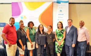 Karolin Troubetzkoy (third from right) with members of her leadership team and the media in Miami earlier this month.