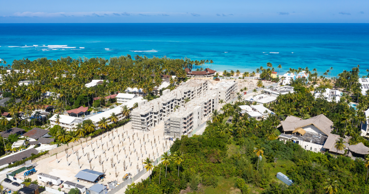 Hotel construction site in the Dominican Republic showing the Caribbean Sea in the background.